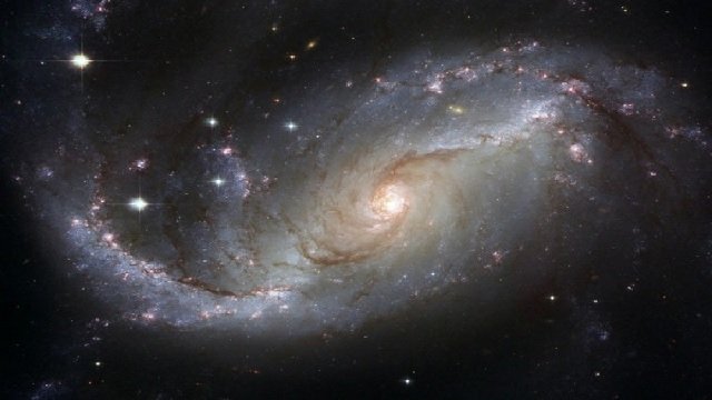 Signs of life outside the solar system: Possibility of biological activity on planet K2-18b